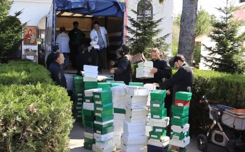 900 de persoane au primit încălţăminte nouă datorită voluntarilor Catedralei Naţionale