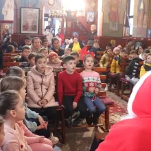 Crăciunul la sat: 1.100 de copii au primit daruri de la Voluntarii Paraclisului Catedralei Naționale